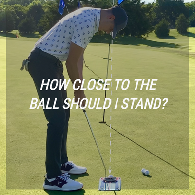 How close to the ball should I stand when putting?